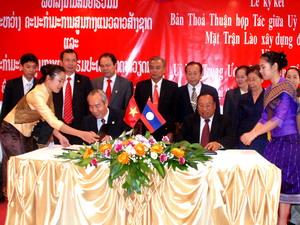 Việt Nam và Lào ký thỏa thuận hợp tác mặt trận 